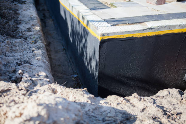 Professional Interior Drainage System technician working in Oakton, VA